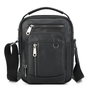 Black genuine leather men crossbody bag detail, multi zipper pockets and sturdy metal hardware.