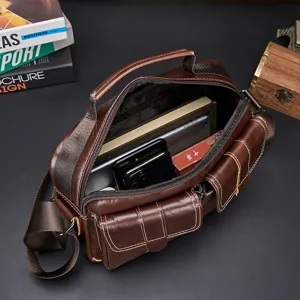Detailed top view of brown genuine leather men's shoulder bag showcasing interior capacity.