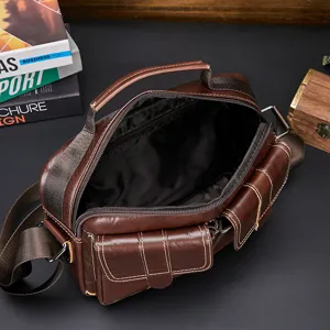 Premium genuine leather mens messenger bag with multiple pockets, stylish shoulder bag for office.