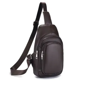 Close-up detail of the dark brown leather chest bag showing zipper and fine texture.