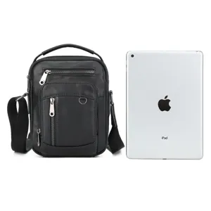 Genuine leather men's messenger bag with multiple zippered pockets and sturdy top handle.