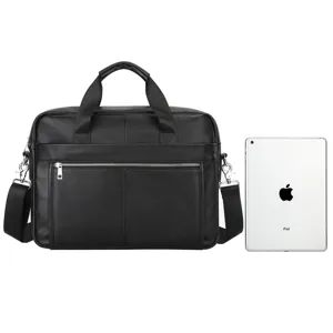 Detail view of the black leather business briefcase showing zipper pocket and handle.