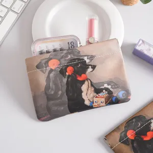 Mini auto-closing storage pouch for lipstick, coins, and small accessories with cute dog print.