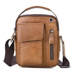 Close-up view of the premium brown leather men's shoulder bag with multi-pockets and zipper.
