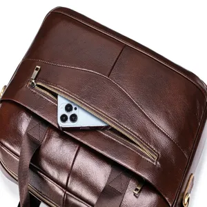 Men's leather business briefcase detail view, vintage brown genuine leather handbag.