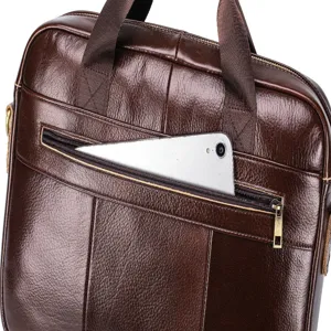 Close-up of premium dark brown leather briefcase front pocket and fine stitching detail.
