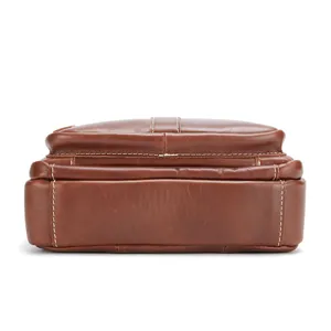 Men genuine leather messenger bag detail view, top layer cowhide, brown retro style.