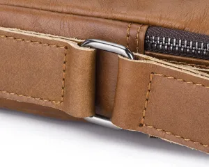 Close-up detail of genuine cowhide leather men bag showing fine stitching and hardware.