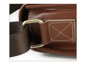 Close up detail showing durable metal hardware and fine stitching on the retro leather bag.