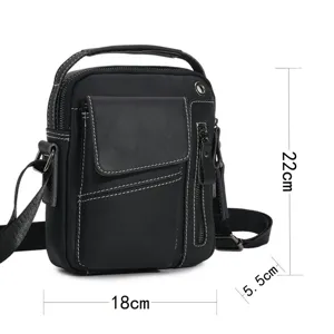 Men leather cross-body bag detail view, compact size, multiple zipper pockets and flap.