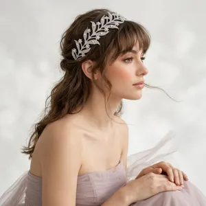 Stunning bridal crystal leaf headband, elegant rhinestone hair vine for wedding party decor.