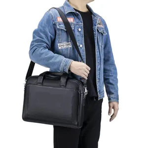 Men's genuine leather business briefcase, top layer cowhide laptop bag for daily office commute.
