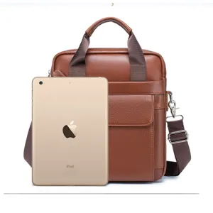 Brown leather men's business briefcase and laptop bag featuring top handle and shoulder strap.