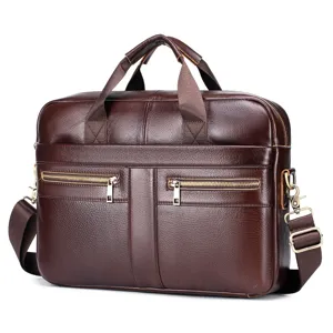 Genuine brown leather business briefcase detail view, metal zippers and adjustable shoulder strap.
