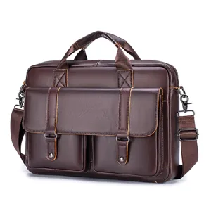 Borsa da lavoro uomo in pelle dettaglio, design vintage con doppia tasca frontale e manico.