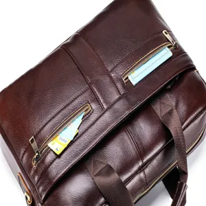 Genuine leather men business briefcase detail shot, showcasing premium cowhide texture and zipper.