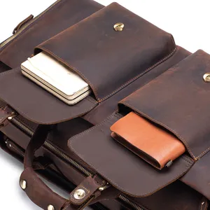 Detailed view of genuine leather travel briefcase showcasing multi pockets and hardware.