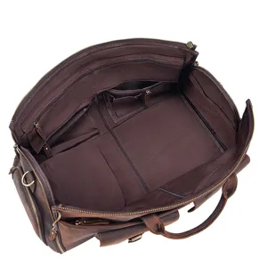 Premium leather travel duffel bag with multi-functional interior compartments and pockets.
