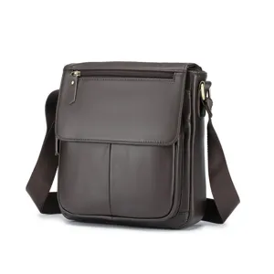 Detail view of men's vintage genuine leather crossbody bag, premium brown shoulder bag design.