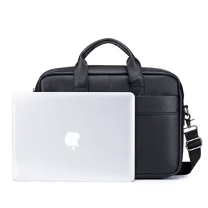 Close-up detail of black genuine leather men business briefcase for laptop daily use.