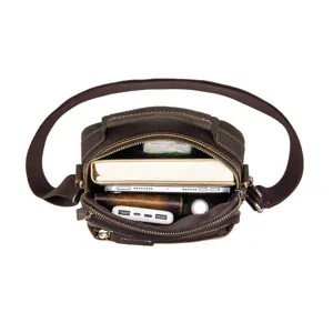 Top view detail of vintage brown leather crossbody bag showing large capacity and multi pockets