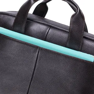 Detailed view of a premium brown leather business briefcase with fine stitching and handles.