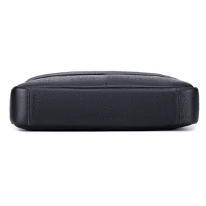 Detailed bottom view of black genuine leather men's business briefcase with fine texture.