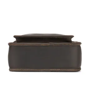 Detail view of the brown leather men's messenger bag showing craftsmanship and durable stitching.
