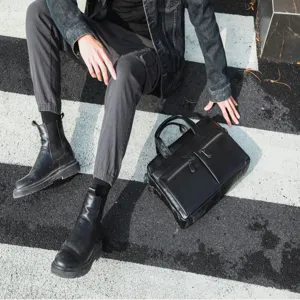 Stylish black leather business briefcase for men, perfect for office and daily casual use.