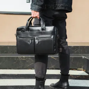 Men black leather business briefcase detail view, professional handbag with dual zippered pockets.
