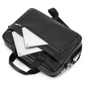 Detail view of black genuine leather business briefcase with zipper pocket and metal hardware.