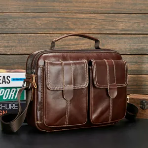 Genuine leather mens business casual shoulder bag detail view with double front pockets.