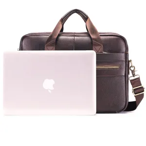 Leather laptop briefcase detail view showcasing premium brown texture and sturdy handle.