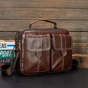 Brown leather men messenger bag detail, multi-pocket business crossbody bag with top handle.