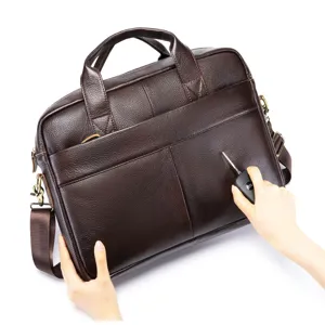 Close-up of premium brown genuine leather business briefcase showing durable texture.