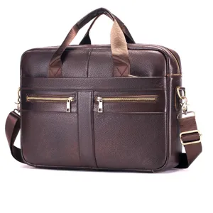 Detailed view of a dark brown leather business briefcase with dual handles and metal zippers.