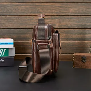 Men genuine leather shoulder crossbody bag side detail view, premium vintage design for business.