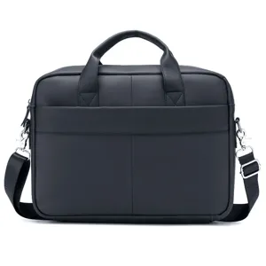 Close-up detail of black leather business briefcase, featuring sturdy handle and strap.