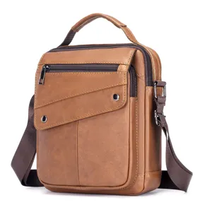 Classic brown leather men vertical crossbody messenger bag with multiple pockets for daily business.