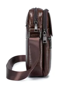 Detailed side view of brown genuine leather men's crossbody bag showing multi-pocket and zippers.
