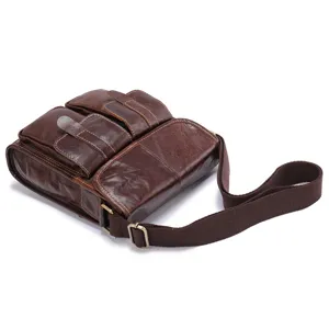 Vintage leather shoulder bag detail showing premium texture, multi pockets and durable strap.