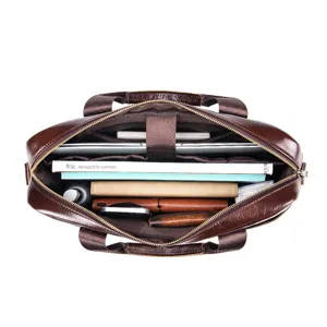 Interior detail view of the brown leather briefcase, showing large capacity and compartments.