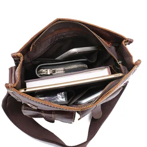 Vintage oil wax leather men's messenger bag interior detail showing large capacity storage.