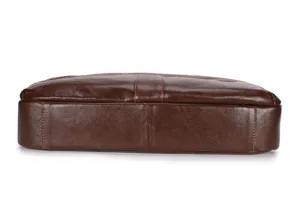 Detailed bottom view of men's genuine leather business briefcase, high quality cowhide.