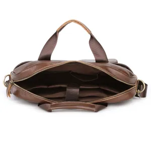 Genuine leather business briefcase interior detail showing spacious compartments for travel work.