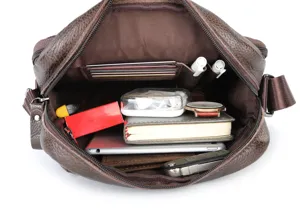 Detailed interior view of men's leather crossbody bag showing multi-slot storage capacity.