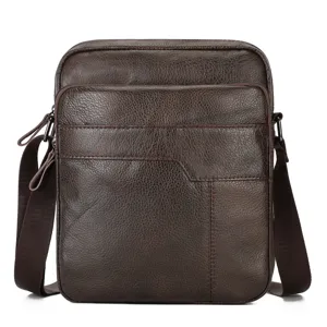 Detailed view of dark brown genuine leather men's messenger bag showing fine texture and stitching.