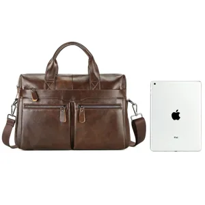 Nahaufnahme einer dunkelbraunen Business-Laptoptasche aus echtem Leder mit doppelten Fronttaschen.