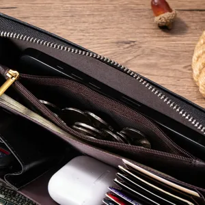 Interior detail of genuine leather men's long wallet showing multiple card slots.