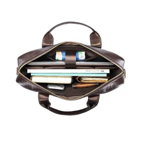 Top grain leather business briefcase interior detail showing spacious laptop compartment and multi-pockets.